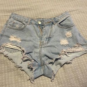 XS blue ripped jean shorts